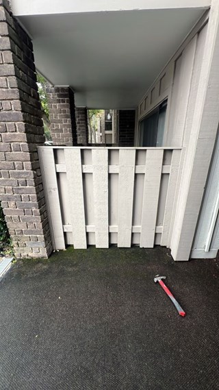 Removed a 16-foot section of wood fencing between four brick columns in Central Houston