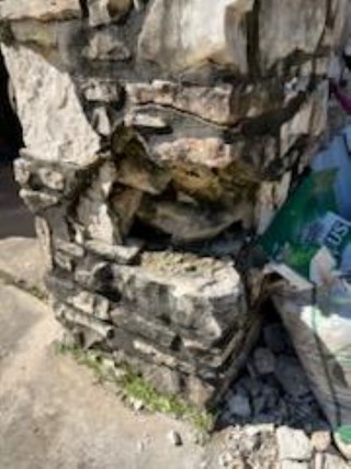 Before stone repair on pillar in Bulverde, TX