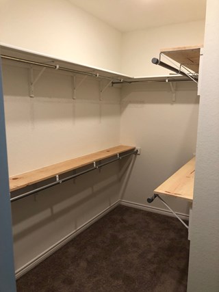 After adding custom built shelving in closet in New Braunfels Texas