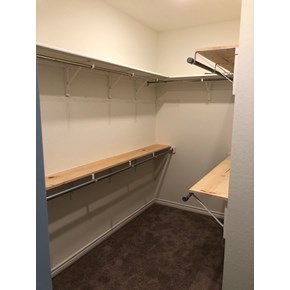 Custom built shelving in bedroom closet in New Braunfels, TX Custom built shelving in bedroom closet in New Braunfels, TX
