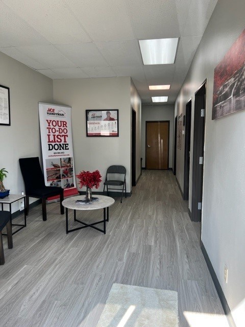Inside Ace Handyman Services North Irving Carrollton Richardson’s office. It has gray floors and walls and black furniture. Inside Ace Handyman Services North Irving Carrollton Richardson’s office. It has gray floors and walls and black furniture.