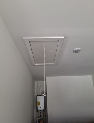 New attic panel installed—secure, clean, and seamless in Pearland