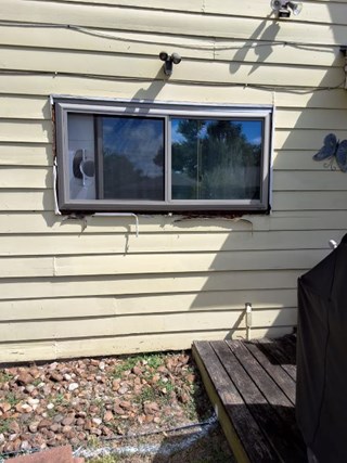 Damaged Window Trim with Wood Rot