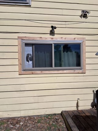 Repaired Window Trim with Fresh Caulking