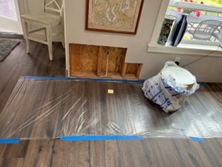Before Drywall patch repair in Port Orchard WA.