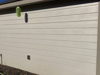 Remodeled home in Benton City, WA, with newly installed vinyl windows expertly fitted by Ace Handyman Services of Tri-Cities.