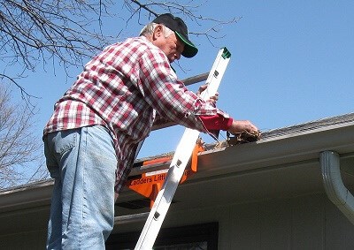 Ladder's Little Helper for gutter cleaning