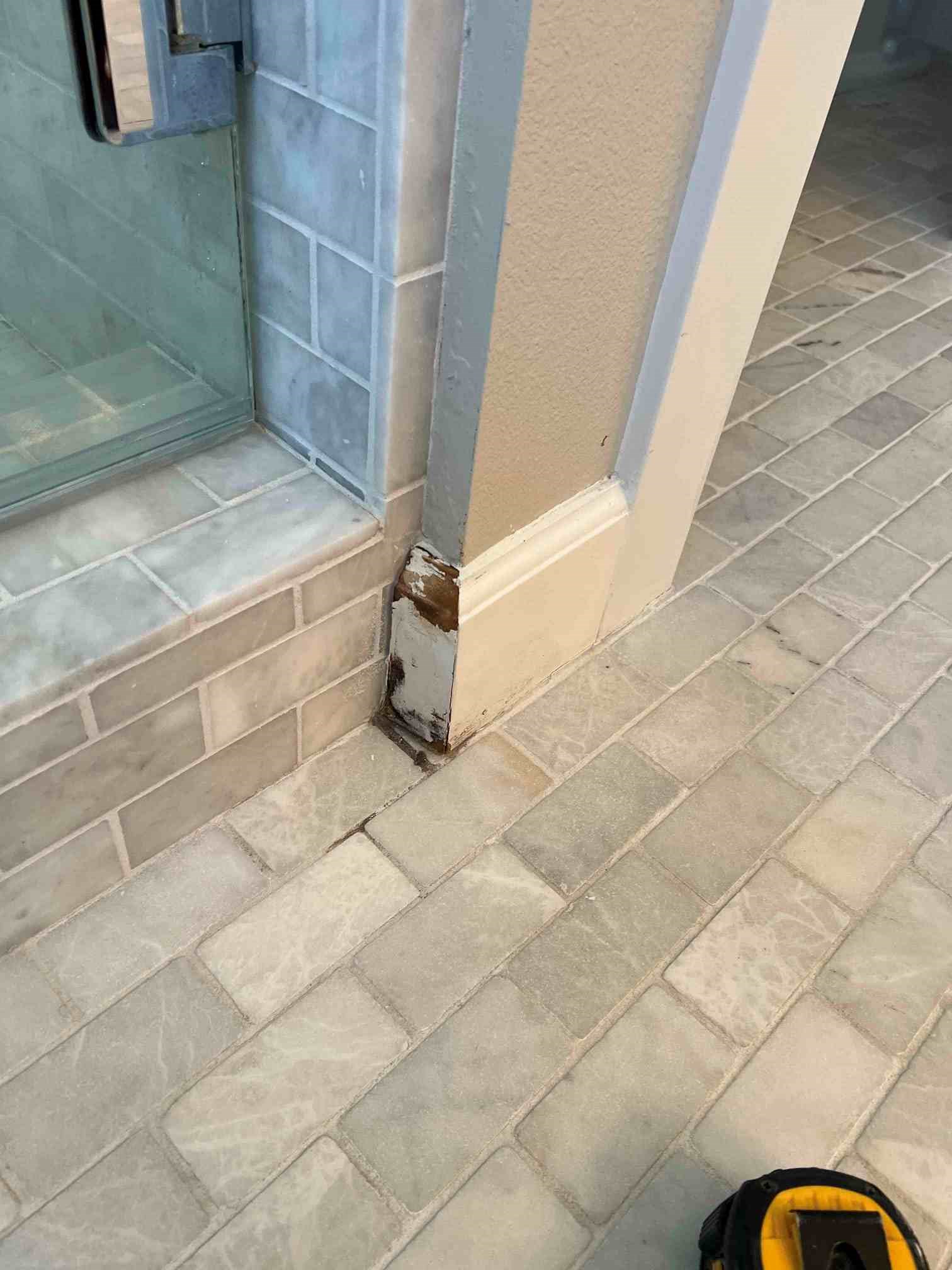 Ace Handyman Services baseboard repair in Costa Mesa, CA, before photo