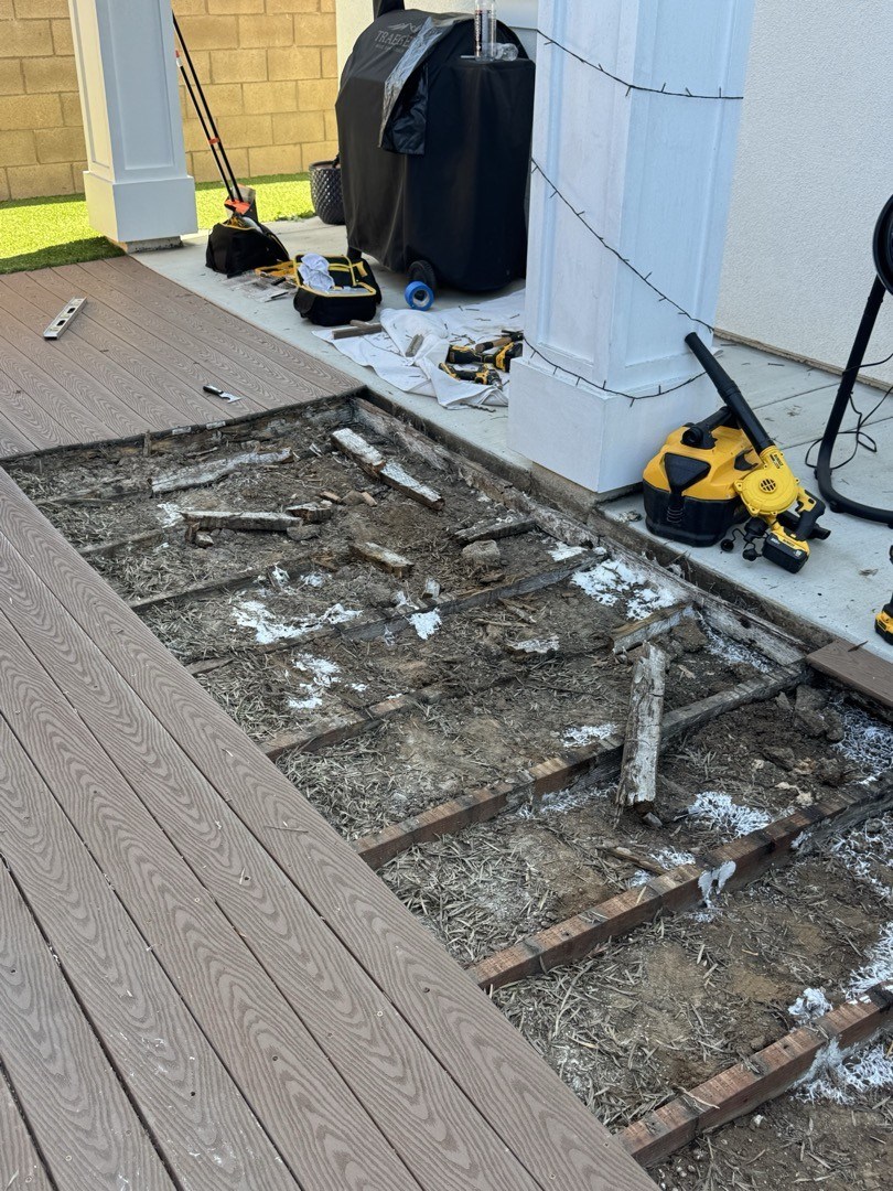 Old wood deck framing broken down under the composite boards Old wood deck framing broken down under the composite boards