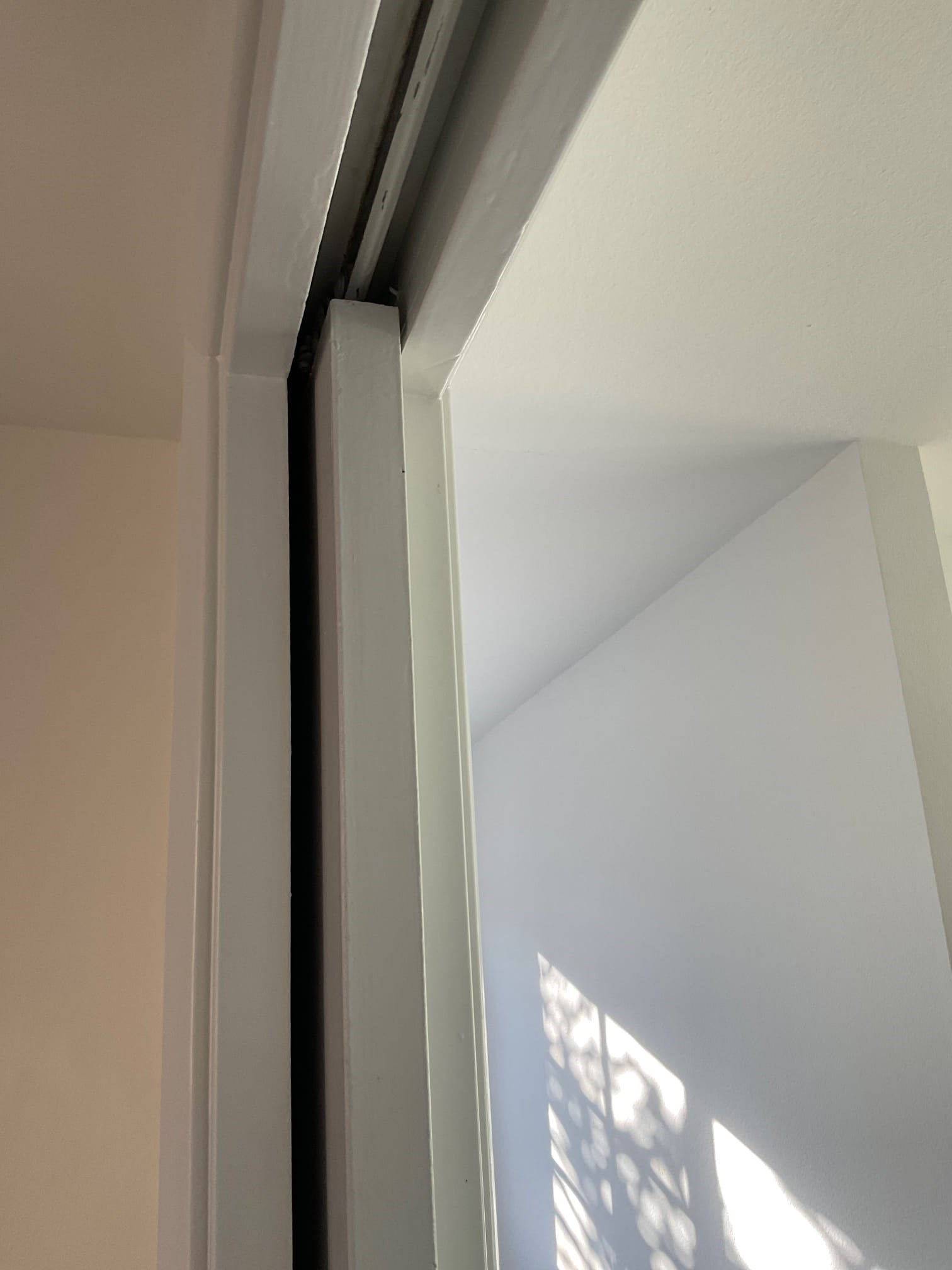 Pocket door repair in an interior wall of a home