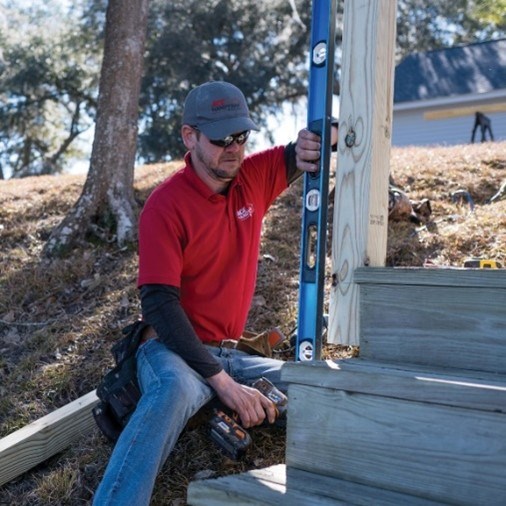 https://acehandyman-dss.ingeniuxondemand.com/Images/Offices/Illinois/Fox Valley/Blog/Ace Handyman Services Fox Valley Handyman Working on Deck.jpg Ace Handyman Services Fox Valley Handyman Works on Deck
