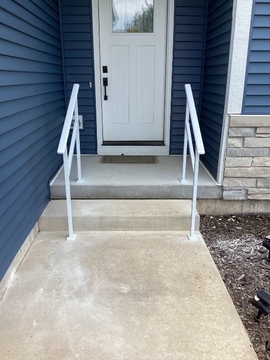 https://acehandyman-dss.ingeniuxondemand.com/Images/Offices/Illinois/Fox Valley/Blog/Something Secure after 1.jpg Front entrance with white metal railings after