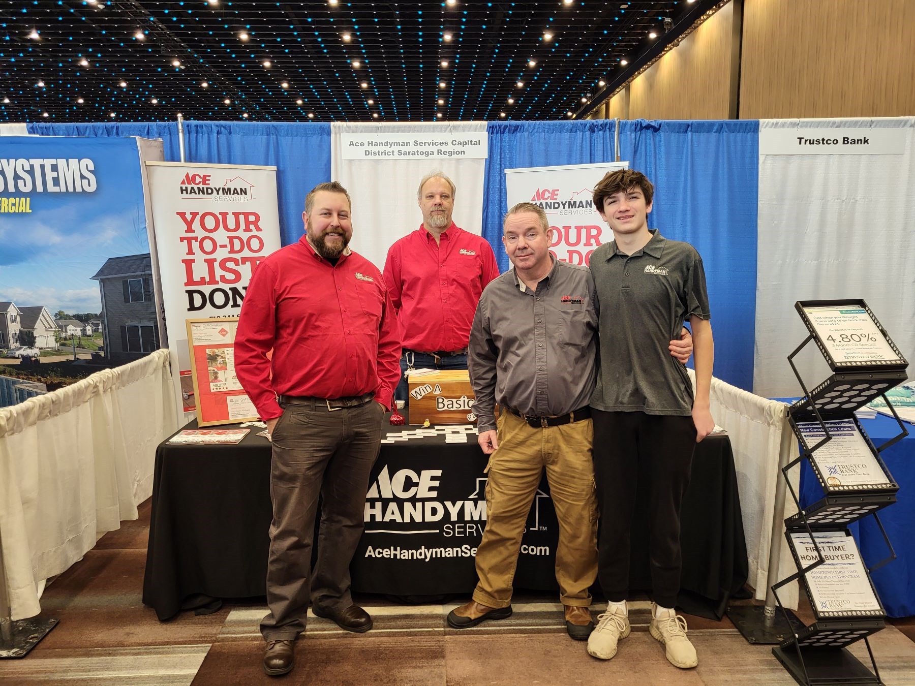 https://acehandyman-dss.ingeniuxondemand.com/Images/Offices/New York/Capital District Saratoga Region/Gallery Images/20240203_101215.jpg The AHS Team--Pete, Troy, Owen and Malachy at the Capital Region Home Show in Albany NY