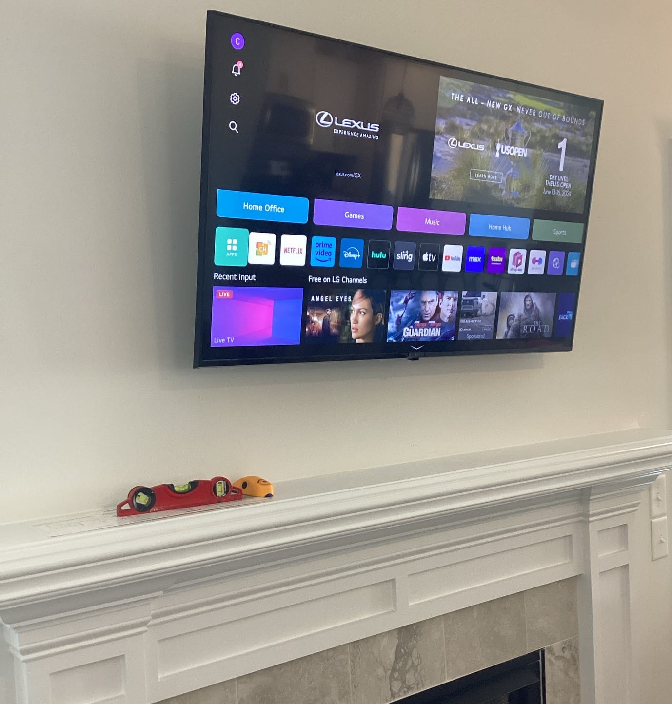 Johnston County NC TV installation above a gas fireplace mantel 