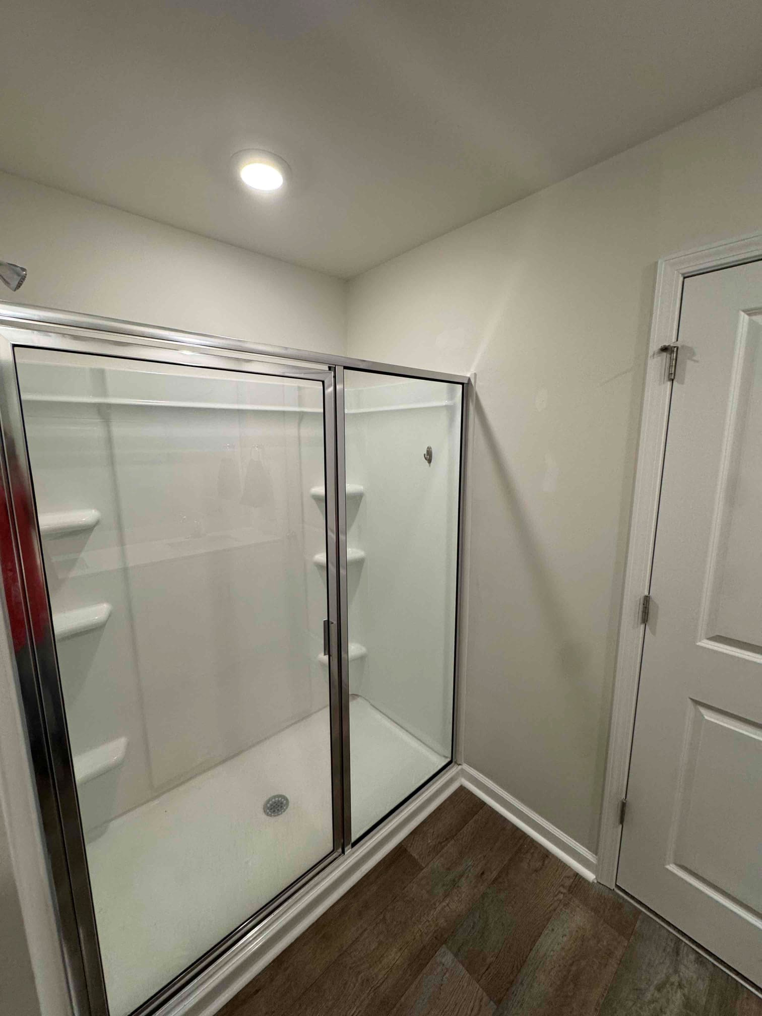 https://acehandyman-dss.ingeniuxondemand.com/Images/Offices/North Carolina/Clayton/31864601-bathroom-drywall-repair-shower-door-install-after_clayton-nc_27520_ace-handyman-services-clayton.jpg Completed bathroom drywall repair, painting, and shower door installation in Clayton, NC.
