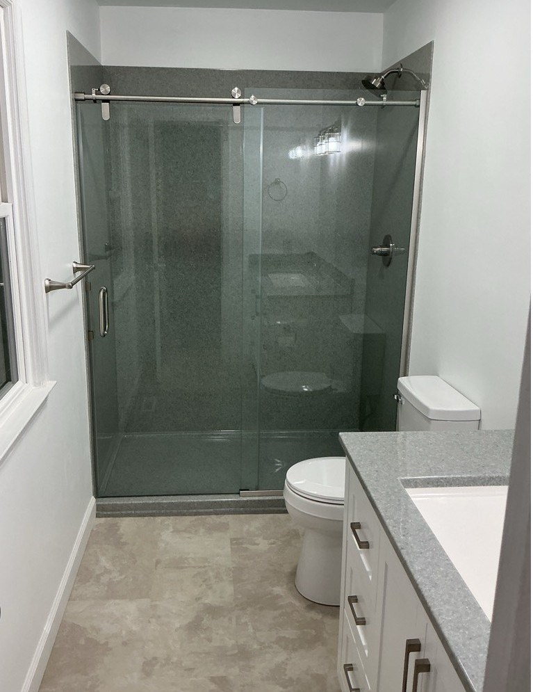 https://acehandyman-dss.ingeniuxondemand.com/Images/Offices/North Carolina/Clayton/49855126-onyx-shower-bathroom-remodel-clayton-27520-nc.jpg Shower and bathroom remodel with a new Onyx shower system, new flooring, vanities, and paint in Clayton NC