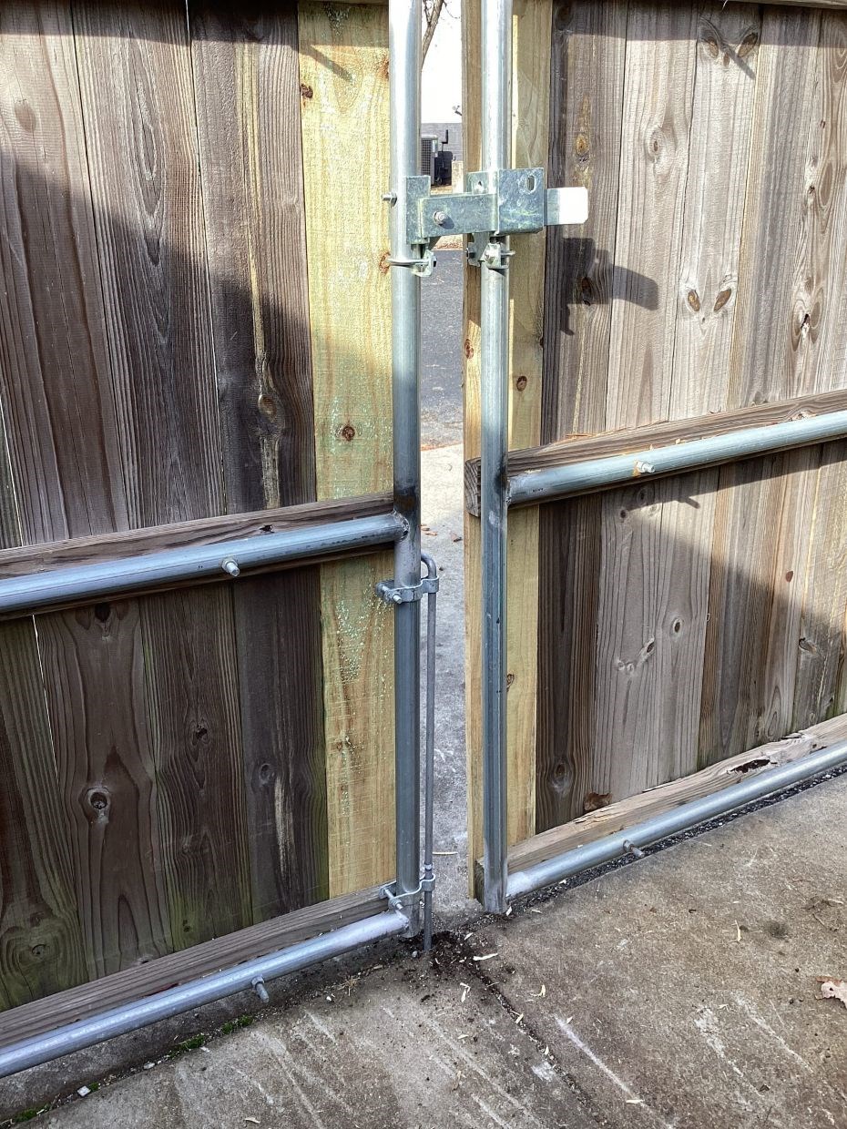 Custom steel-frame fence gate repair for a business in Durham, NC
