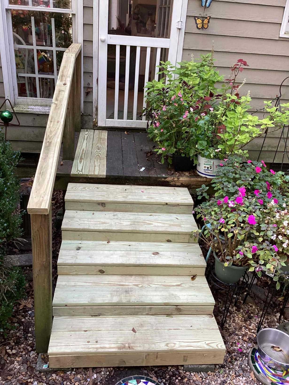 https://acehandyman-dss.ingeniuxondemand.com/Images/Offices/North Carolina/Durham Chapel Hill/37209884-rebuilt-pressure-treated-wood-steps-with-new-handrail-after-forest-hills-durham-nc-ace-handyman-service.jpg Rebuilt pressure-treated wood steps with new handrail after replacement at a Forest Hills, Durham, NC home by Ace Handyman Services