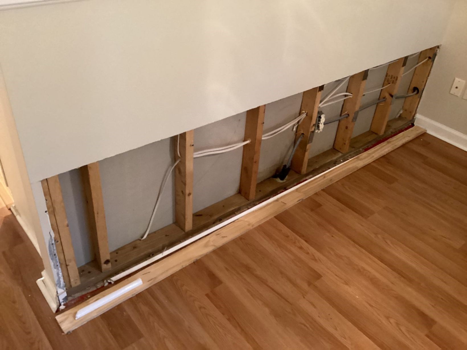 all drywall removed back to framing for water damage repair in a South Durham, NC home before replacement by Ace Handyman Services