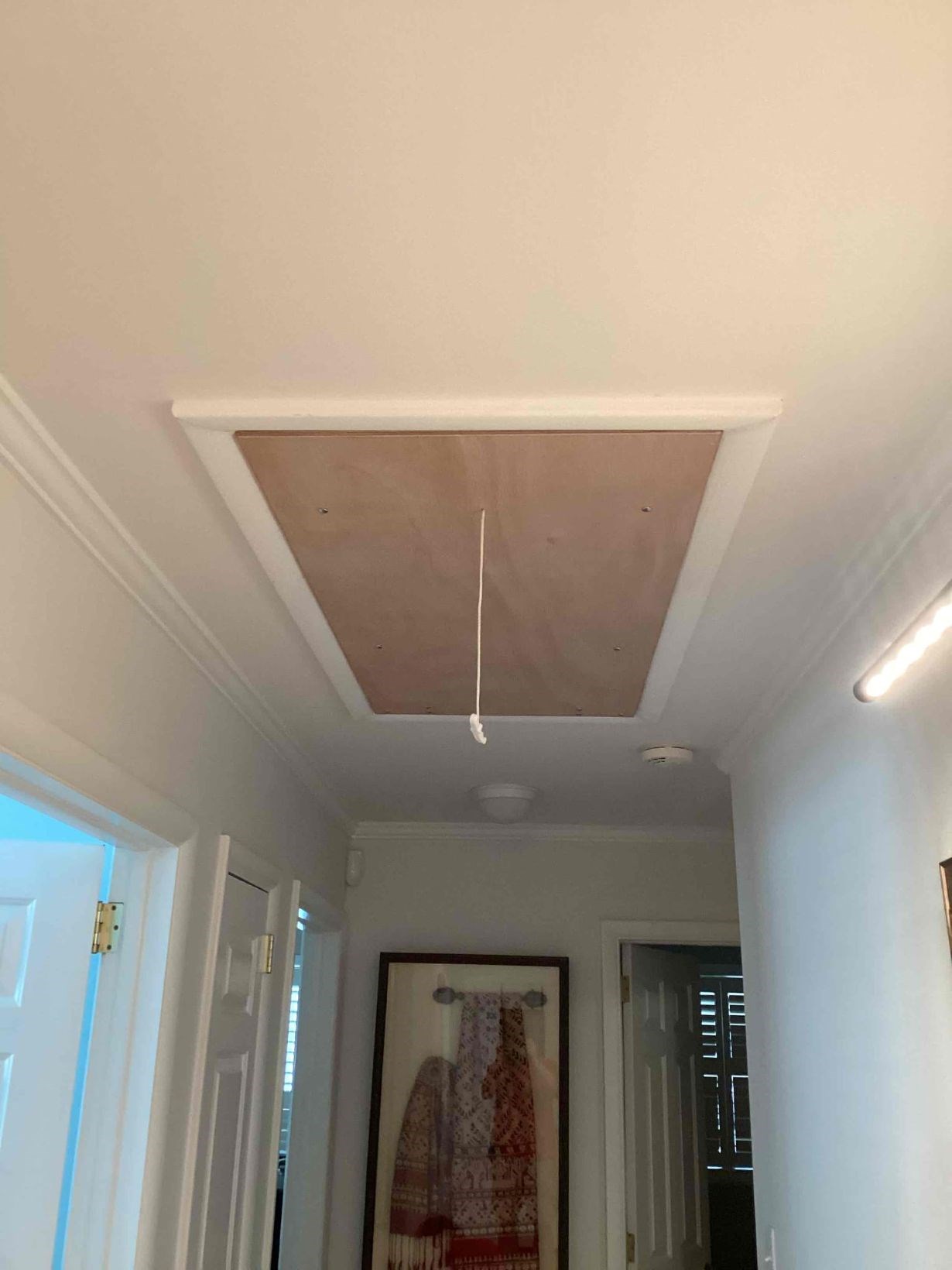 https://acehandyman-dss.ingeniuxondemand.com/Images/Offices/North Carolina/Greater Triangle/Photos/37913494-attic-ladder-installation-closed-raleigh-27608.jpg