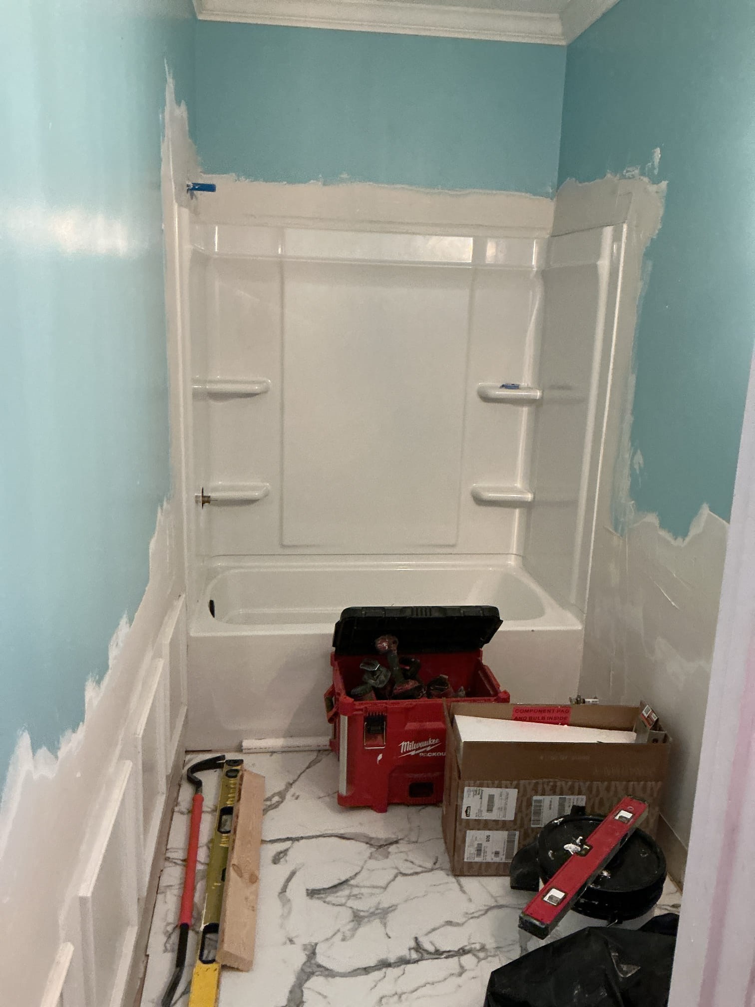 https://acehandyman-dss.ingeniuxondemand.com/Images/Offices/North Carolina/Greater Triangle/Photos/In-Progress-Bathroom-Renovation-By-Ace-Handyman-Services-Greater-Triangle-Apex-NC.jpg In-progress bathroom renovation in Apex NC with new tub surround, wall repair, and wainscoting by Ace Handyman Services Greater Triangle
