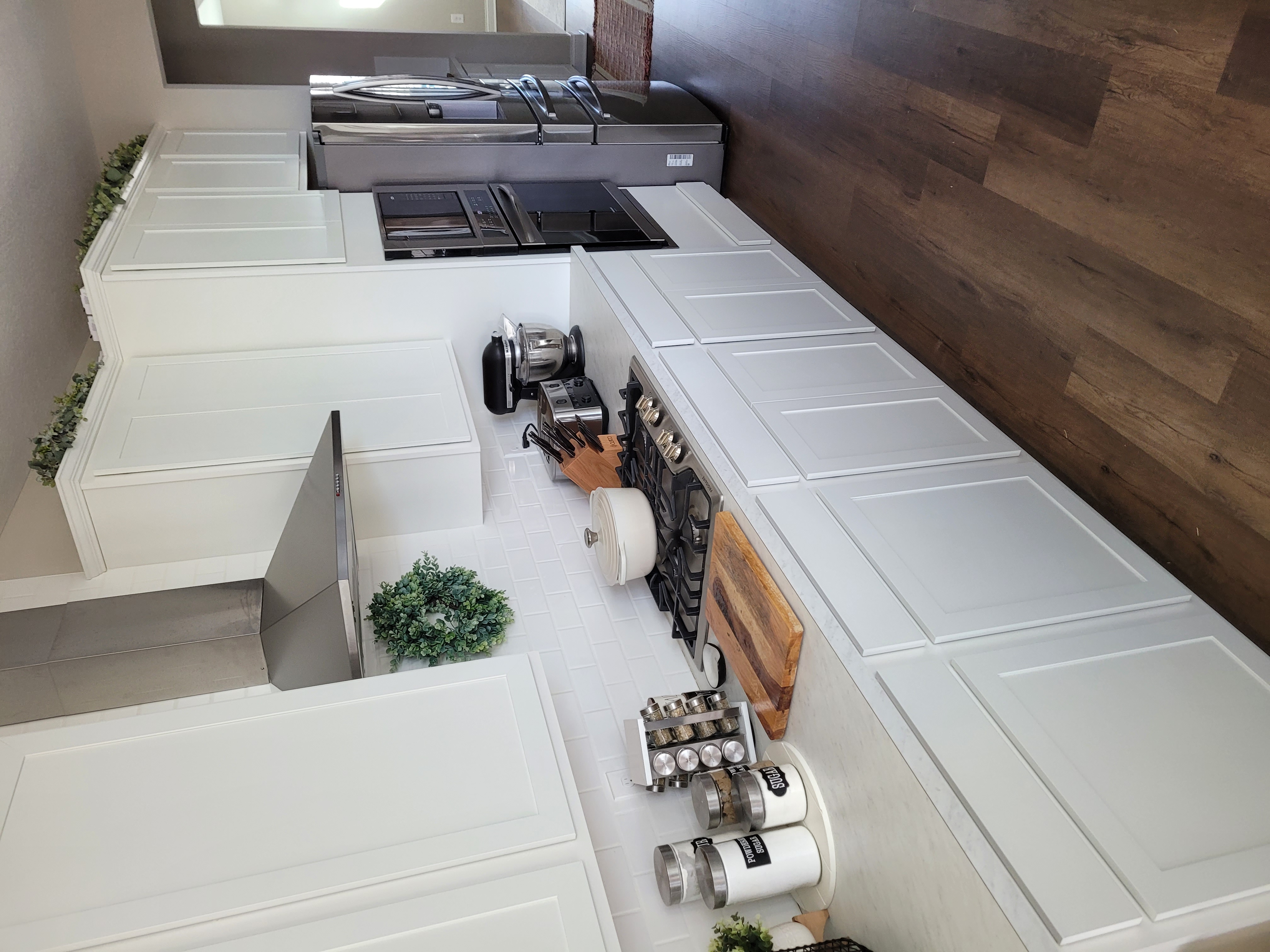 https://acehandyman-dss.ingeniuxondemand.com/Images/Offices/Ohio/Northwest Columbus/images/Boggs Before 2 Delaware.jpg Modern kitchen with white cabinets, stove, and stainless appliances.